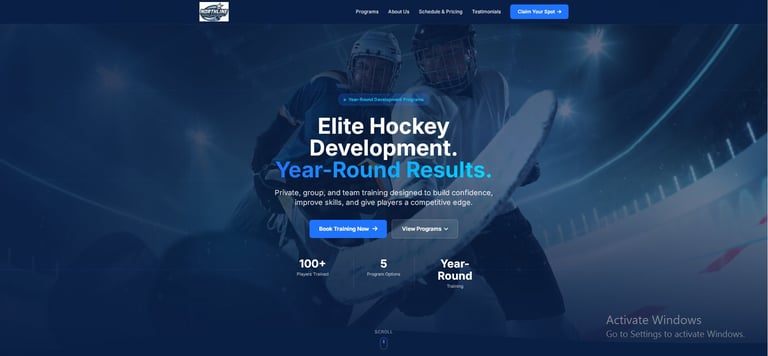 Website header for Elite Hockey Development featuring two hockey players in action with Year-Round Results tagline and statistics displayed